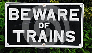 Beware of trains sign.