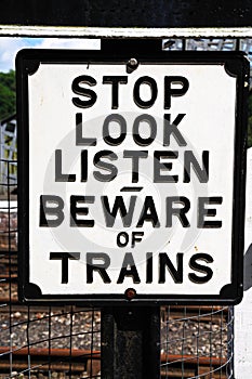 Beware of trains sign.