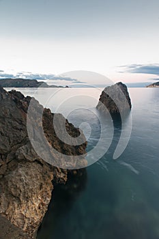 Bewitching view of the sea flowing between rocks