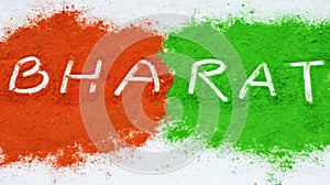 Bharat written on two colors of indian flag green and orange on a white wooden board. Concept of Indian independence day