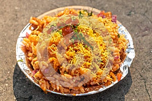 Bhel Puri or BhelPuri Chaat in paper bowl