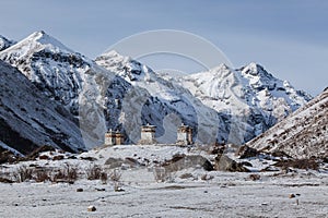 Bhuddist stupas in snowy Himalayan mountains, Bhutan