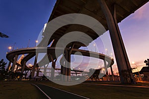 Bhumibol Bridge above park at twilight, Bangkok