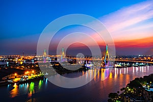 Bhumibol suspension bridge over Chao Phraya River at sunset in Bangkok city, Thailand