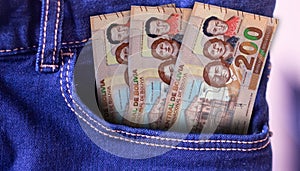 Bhutan 500 Ngultrum Banknotes in Pocket of Jeans