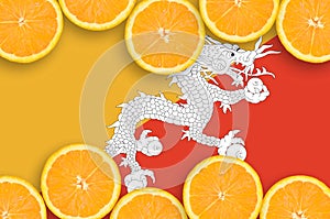 Bhutan flag in citrus fruit slices horizontal frame