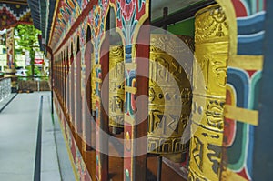 Bhutanese prayer wheels or Mani wheels, made of copper with the holy mantra printed on the wheels, the symbol of Bhutanese