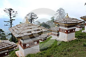 Bhutanese style stupas at the Dochula Pass in Bhu photo