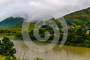 Bhutanese village near the river at Punakha, Bhutan