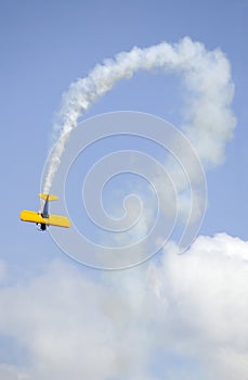 Bi-plane and Curved Smoke Trail