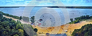 BIALOBRZEGI, POLAND - JULY 13-15, 2019: Beautiful panoramic aerial drone view on people having fun during concert on the Wibracje