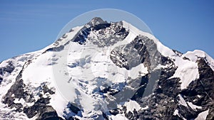 Piz Bernina and the Bianco Ridge in the Swiss Alps