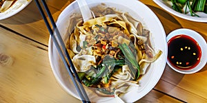 Biang Biang noodles -Thick, broad, hand-pulled noodles seasoned with chilli, garlic and Sichuan pepper, Biang Biang