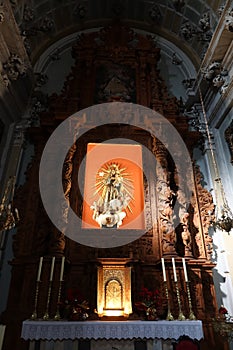 Main altar of the Churrigueresque style Communion Chapel inside the church of Our Lady of the Assumption of Biar, Alicante, Spain photo