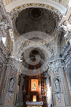 Altar and dome of the Churrigueresque style Communion Chapel of Biar, Alicante, Spain photo