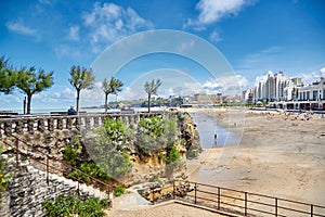 Biarritz, France. Resting place with benches, trees and a beautiful view of the La Grande Plage. Bay of Biscay, Atlantic coast photo