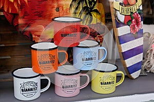 biarritz sign text vintage and logo brand on mug pyramid of bowls colored cups with