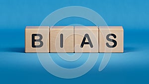 Bias - text on wooden blocks, personal opinions prejudice