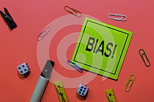 Bias! write on sticky notes isolated on Pink background