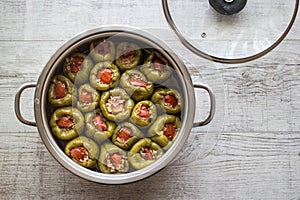 Biber Dolmasi / Turkish Stuffed Peppers in a pan. photo