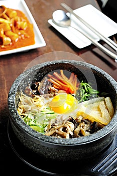 Bibimbap in a heated stone bowl