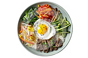 bibimbap, a Korean dish featuring mixed rice topped with bulgogi (marinated grilled beef), assorted vegetables