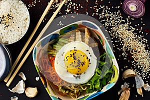 Bibimbap. Mixed rice with meat and vegetables.