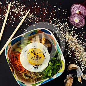 Bibimbap. Mixed rice with meat and vegetables.