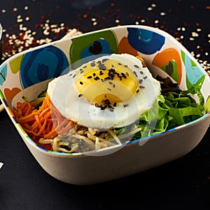 Bibimbap. Mixed rice with meat and vegetables.