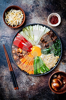 Bibimbap, traditional Korean dish, rice with vegetables and beef.