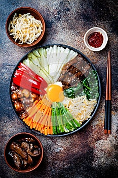 Bibimbap, traditional Korean dish, rice with vegetables and beef.