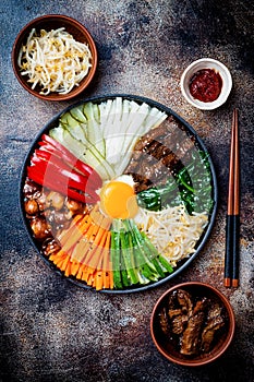 Bibimbap, traditional Korean dish, rice with vegetables and beef.