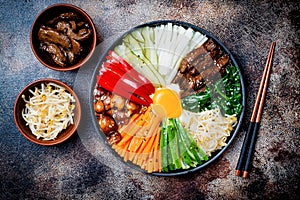 Bibimbap, traditional Korean dish, rice with vegetables and beef.