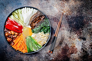 Bibimbap, traditional Korean dish, rice with vegetables and beef.