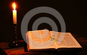 Bible book candle