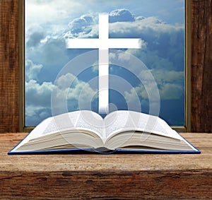 Bible christian cross stormy sky view window open