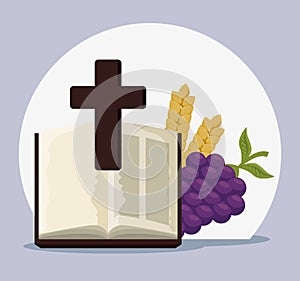 bible with cross and grapes to first communion