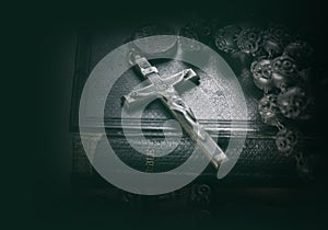 Bible and cross religious concept image