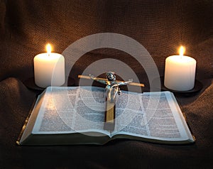 Bible, Crucifix and Two Candles