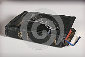 Bible and eyeglasses
