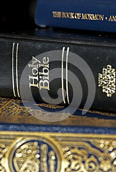 Bible and Koran (Qur'an) and Book of Mormon