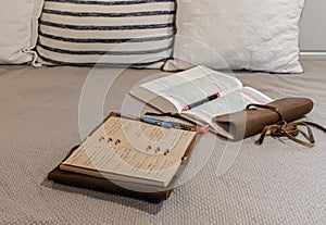 Bible and notebook laid open for bible study