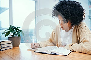 Bible, notes and woman studying religion at desk in home, Christian faith and knowledge of God for hope. Reading