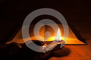 Bible and Oil Lamp photo