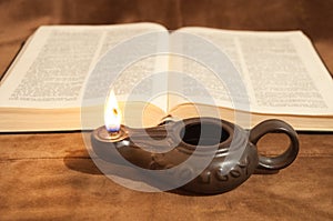 Bible and Oil Lamp