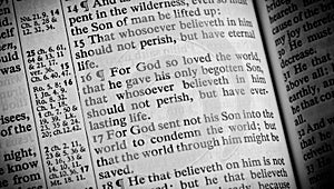 A Bible opened to John 3:16