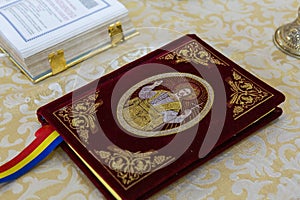 Bible and other holy books on a priest table 