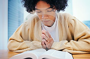 Bible, prayer and woman in home for religion, Christian worship and reading to study. Person, holy book and meditation