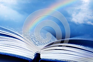 Bible with rainbow photo