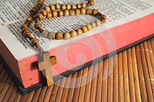 Bible with rosaries-beads crucifix photo